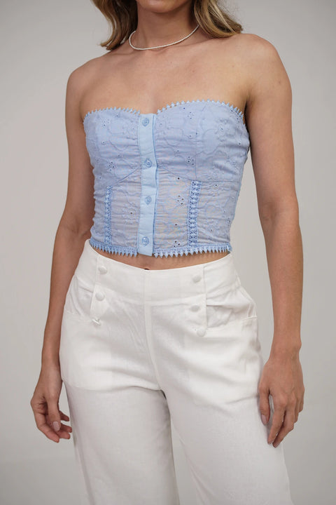 TOP STRAPLESS DE OJALILLO CON DETALLE DE BOTONES Y AJUSTE ELASTICO EN LA ESPALDA REF 0515