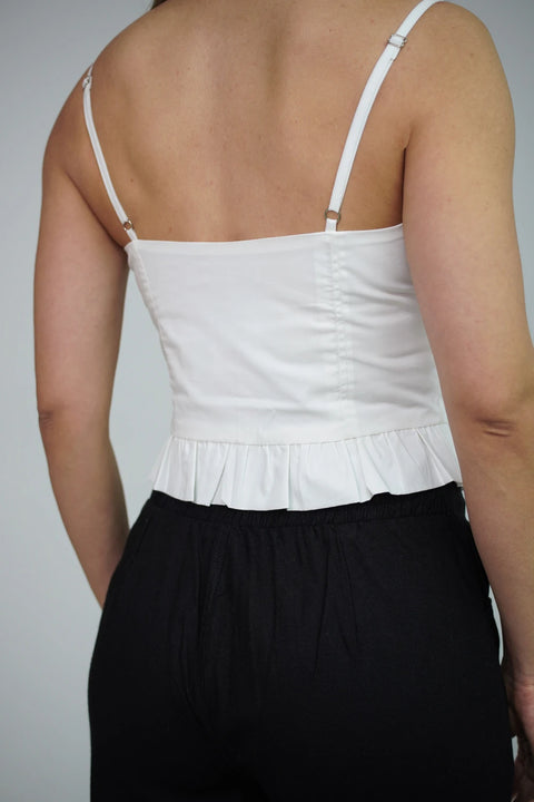 BLUSA ESTILO CORSÉ CON TIRANTES, BROCHES FRONTALES  Y VOLANTE PEPLUM REF 0518